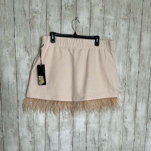 Elegant Feathered Mini Skirt in Blush Pink